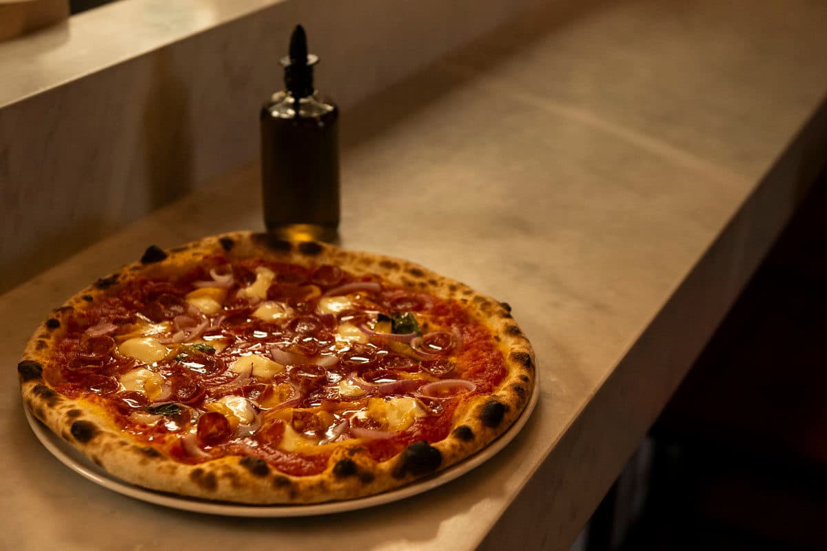 Wood-fired pizza at an Aurora restaurant